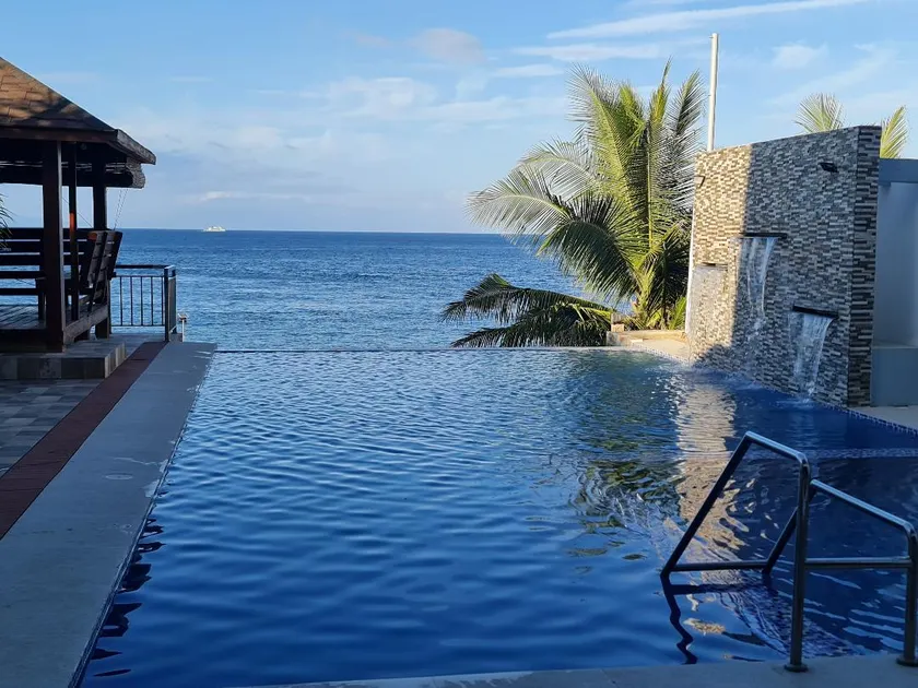 BEACHFRONT VILLA with INFINITY POOL - Image 1