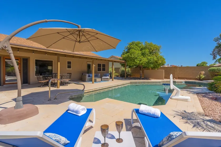 HUGE, heated pool. Family friendly, toys for all!  Big & beautiful backyard!  - Image 1