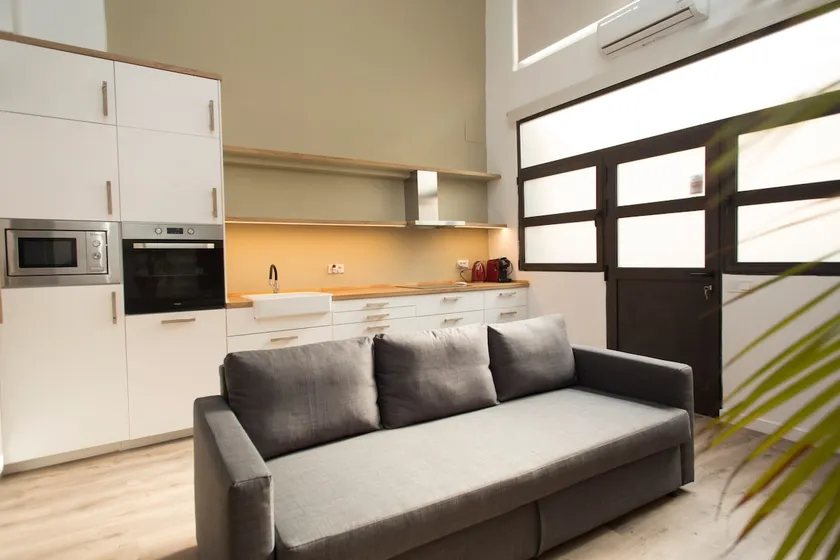 Lovely loft with a patio - Image 1