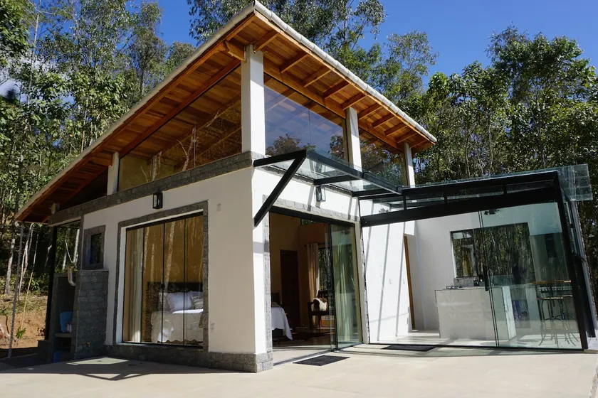 Beautiful glass house with a view and lush water - Image 1