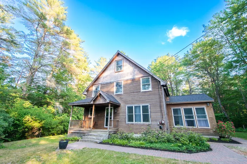 Stylish and Sun Filled Home With Tripp Pond Access - Image 1