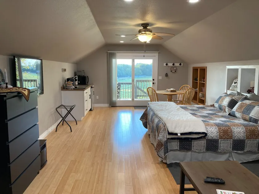 Farm Style Suite overlooking a hillside pasture. - Image 1