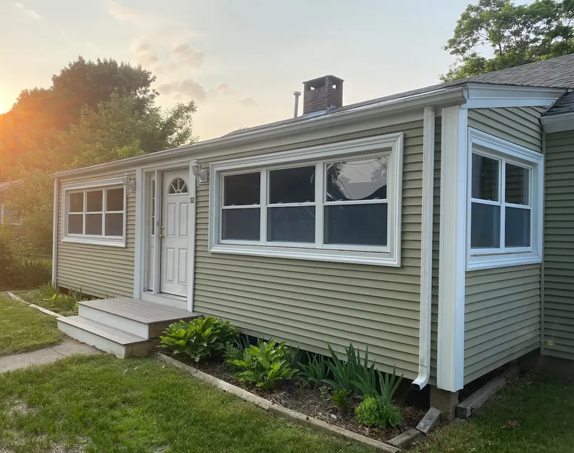 Beach House by Narrow River - Image 1