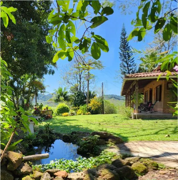 Ranch with a swimming pool and river in front of the gate. - Image 1
