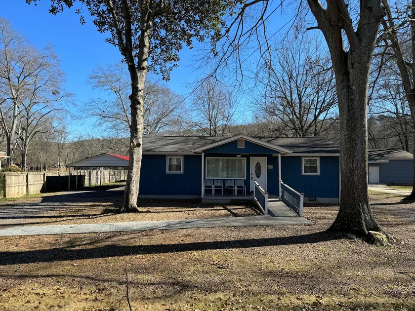 Blue House on the Creek - Image 1