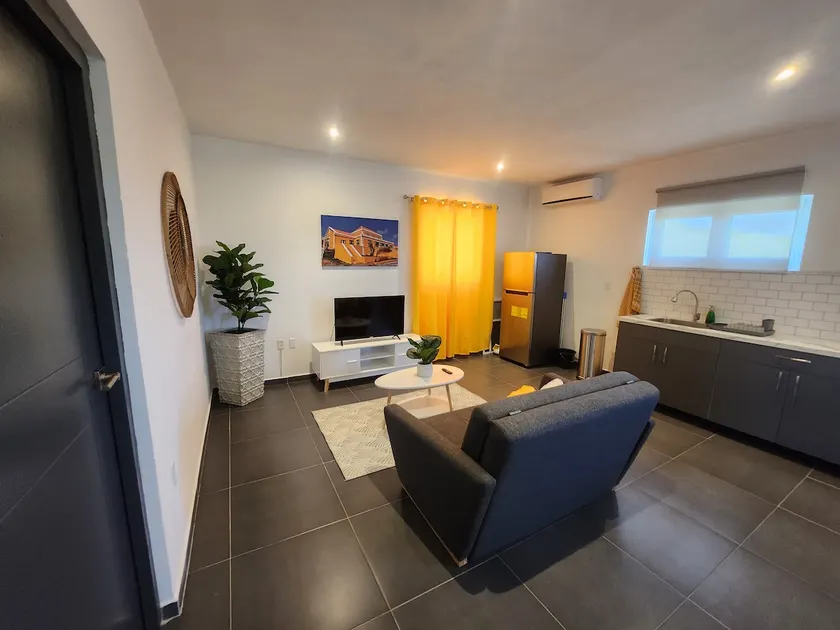 Modern sunshine yellow apartment with nature views - Image 1