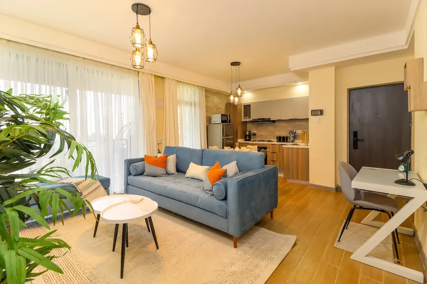 Gorgeous 2BR Central Gem w/ Rooftop, Gym & Pool - Image 1