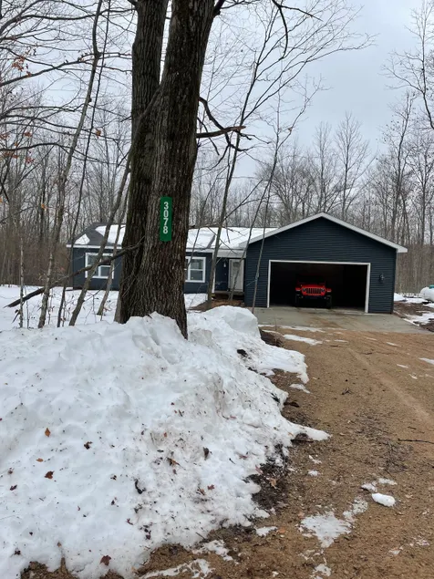 Home in the woods nestled on 15 wooded acres. - Image 1