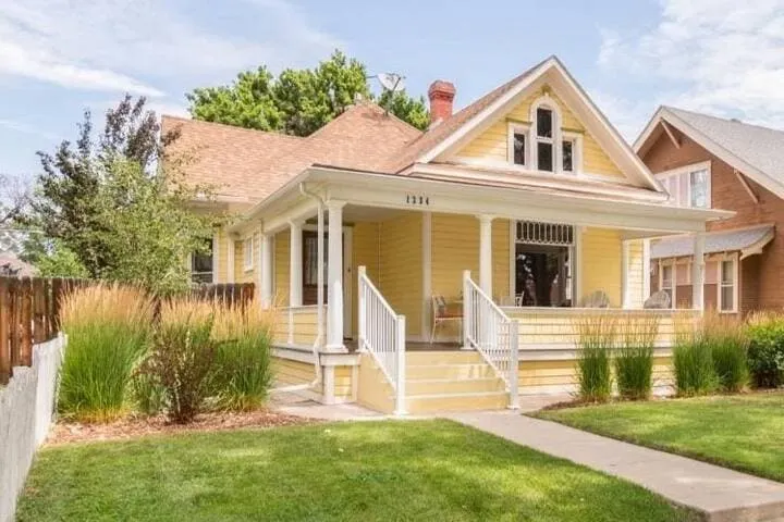 Yellow House on Main - Image 1