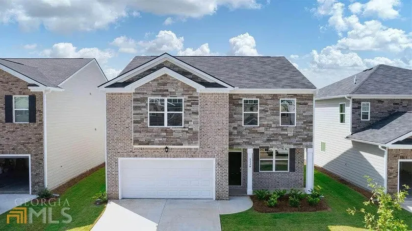 Spacious 4BR Near ATL | Ideal for Extended Stays - Image 1