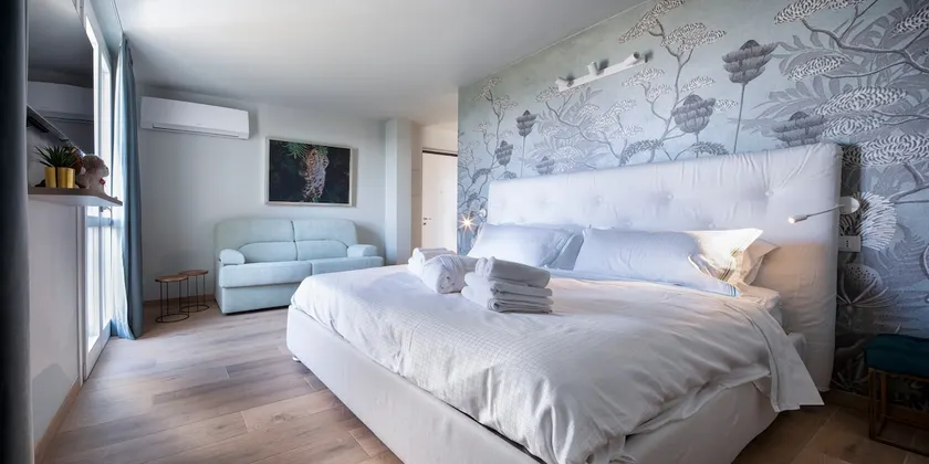 San Raffaele Apartment with Free Parking and Air Conditioning - Image 1