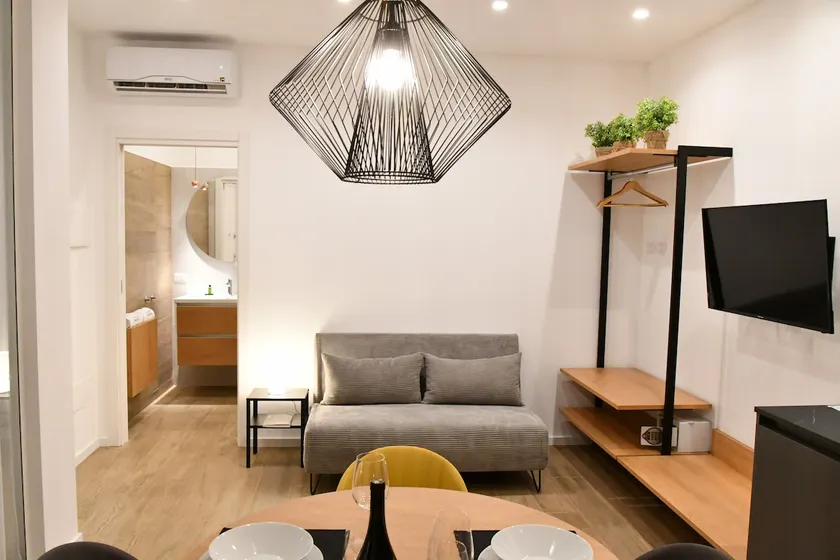 Nu House Rooms & Apartments - Image 1