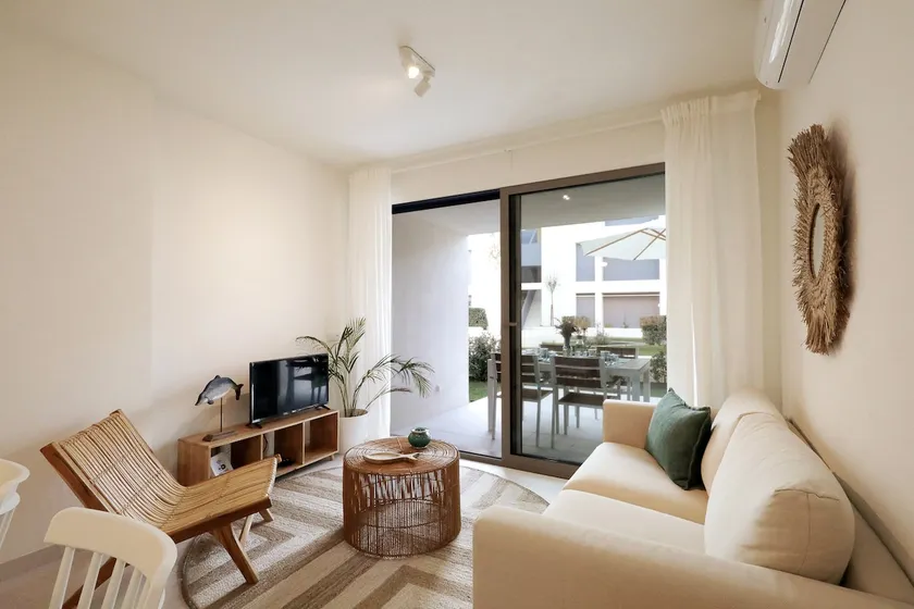 Elegant 2BR Apartment with Pool & Garden - Image 1