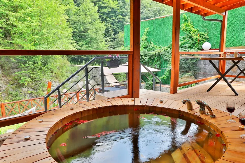 Villa with a Hot Tub and a View of a Waterfall - Image 1
