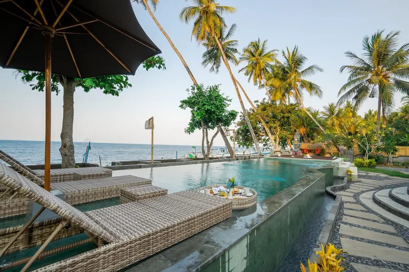 4 Bedrooms Beachfront Bali Taoka Beach Villa - Image 1