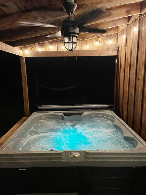 Secluded Riverfront Adirondack Cabin • Hot Tub - Image 1