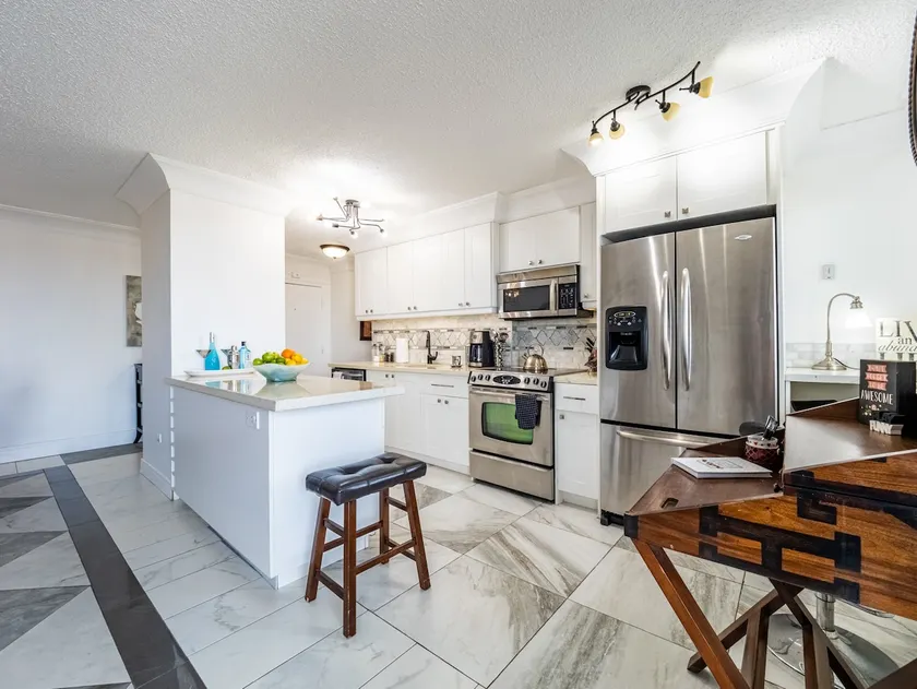 Steps to Jasper Ave - 1 Bedroom - U/G Parking - Image 1