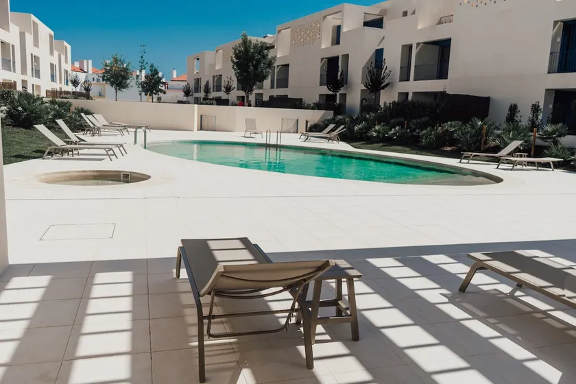 Elegant 2BR Apartment with Pool & Garden - Image 1