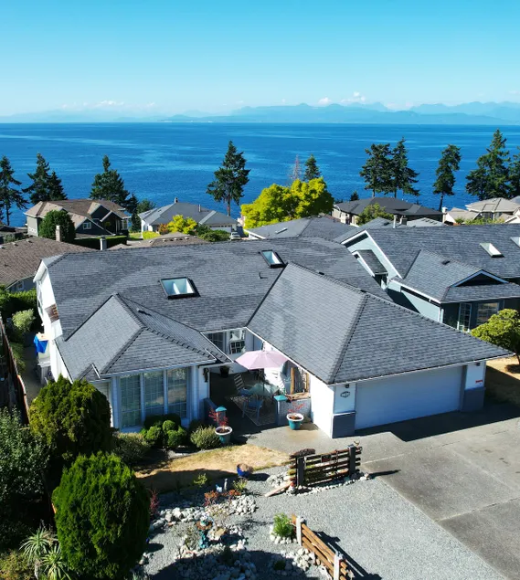Two bedroom legal suite with mountain & ocean view - Image 1