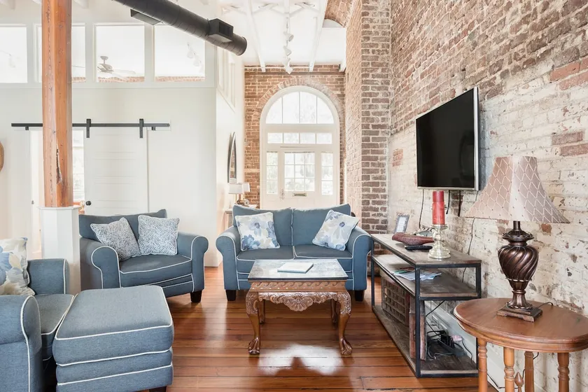 Downtown Riverfront Condo With Industrial Accents - Image 1