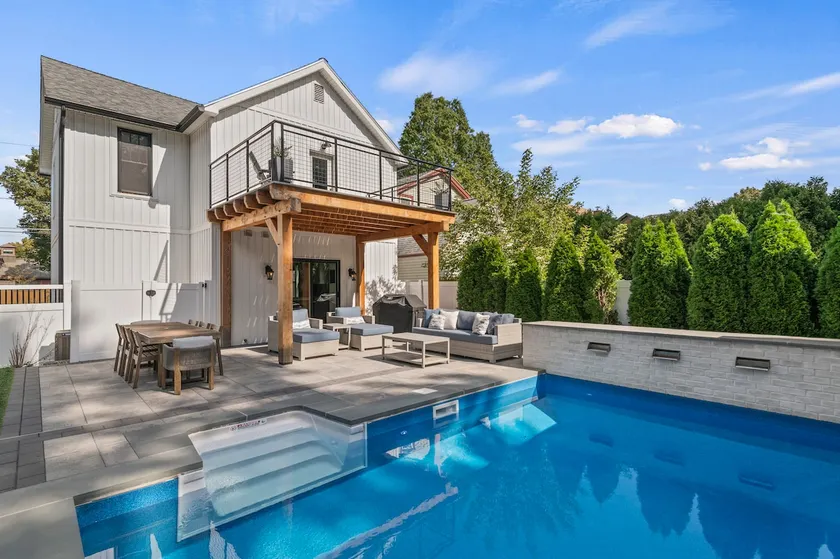 Luxury Oasis: Heated Pool + Walk to Town/Track - Image 1
