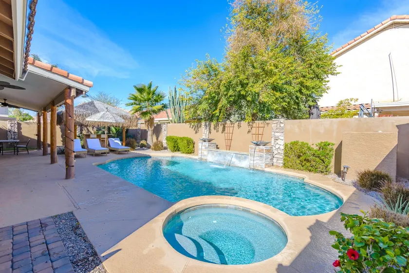 Boho 4BR Retreat Heated Pool Spa Tiki Bar - Image 1