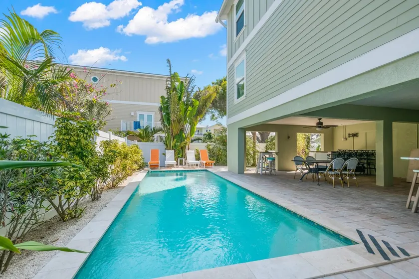 Family Tides – AMI Two-Unit Retreat w/ Pool, Rooftop Deck & Gulf/Bay Views - Image 1