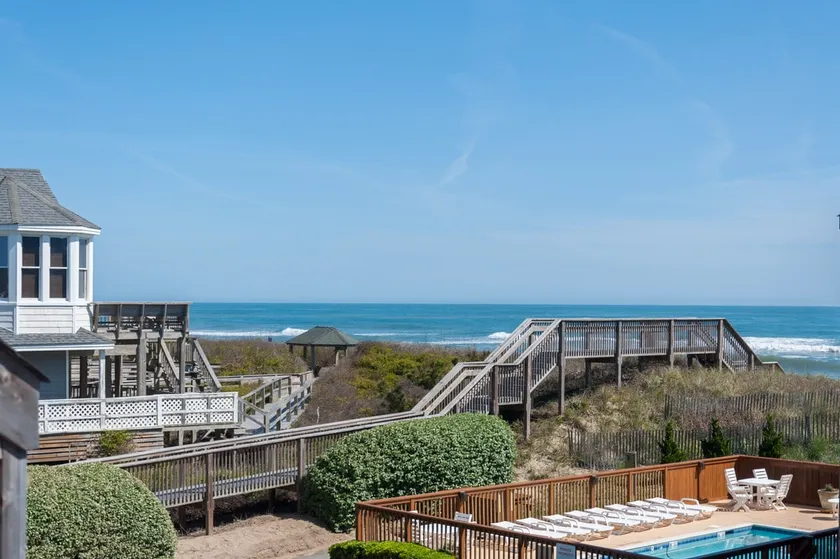 Whispering Sands # 7: vue sur l'océan depuis 2 ponts, piscine communautaire, proche de bons restaurants. - Image 1