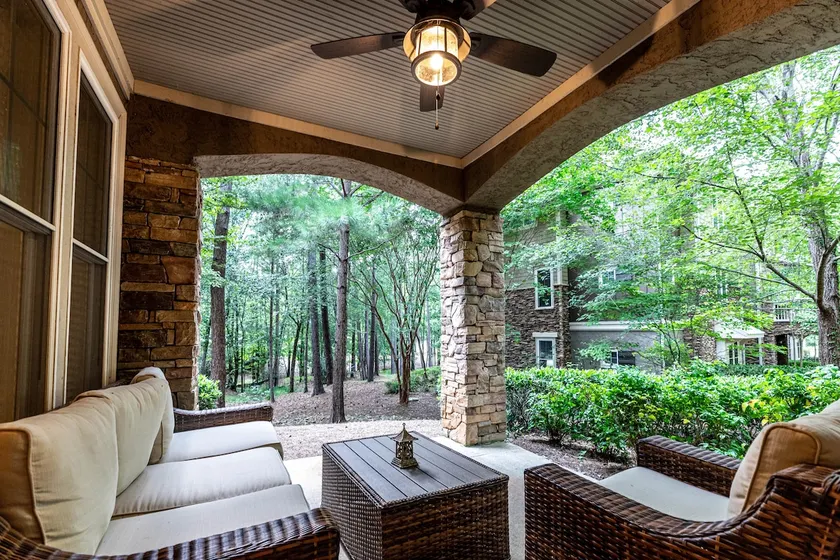 Escape to this Reynolds Lake Oconee two bedroom condo nestled in nature. - Image 1