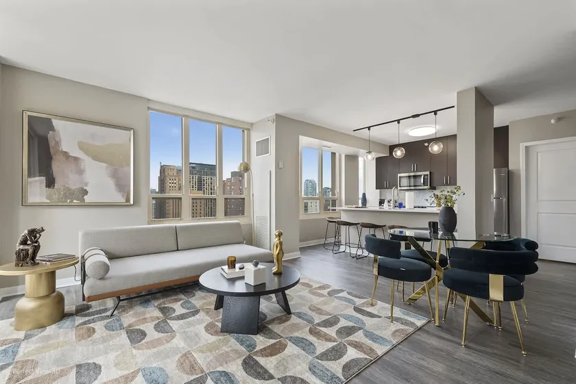 Elegant 2BR with Resort Amenities & City Views - Image 1