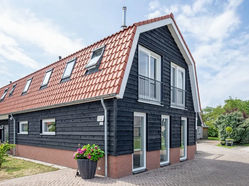 Holiday home near forest with wellness garden - Image 1