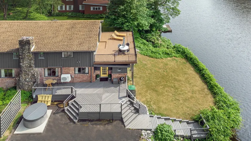 Chic Waterfront w/ Hot Tub, Sauna and Sky Deck! - Image 1
