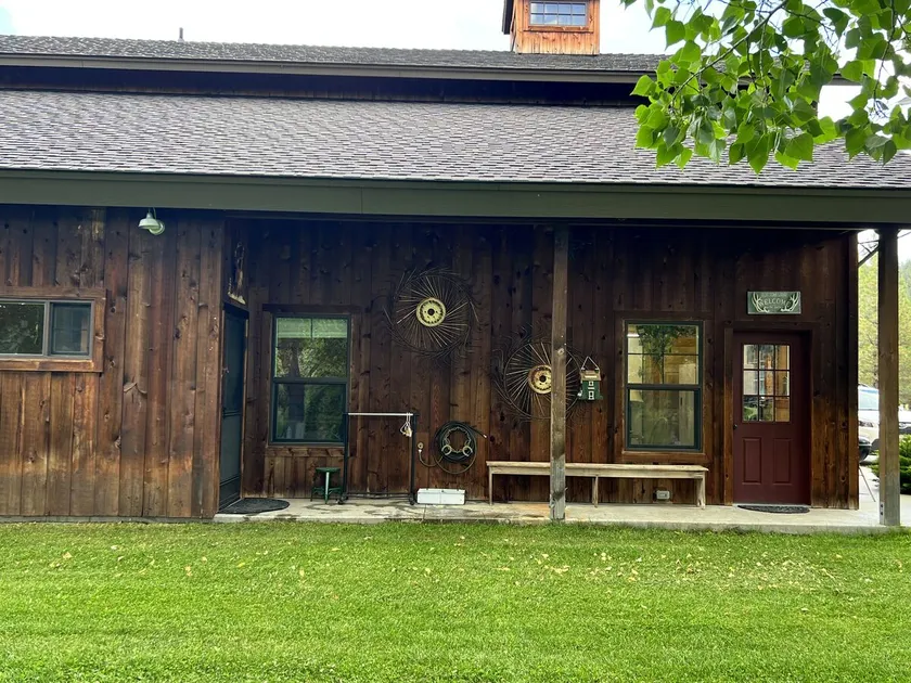 Relax at this Charming Riverside Retreat - Image 1