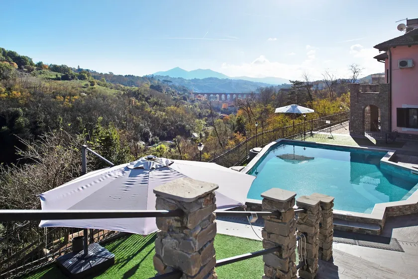 Casa de férias \"Baia di Campo\" com piscina partilhada, jardim privado e Wi-Fi - Image 1