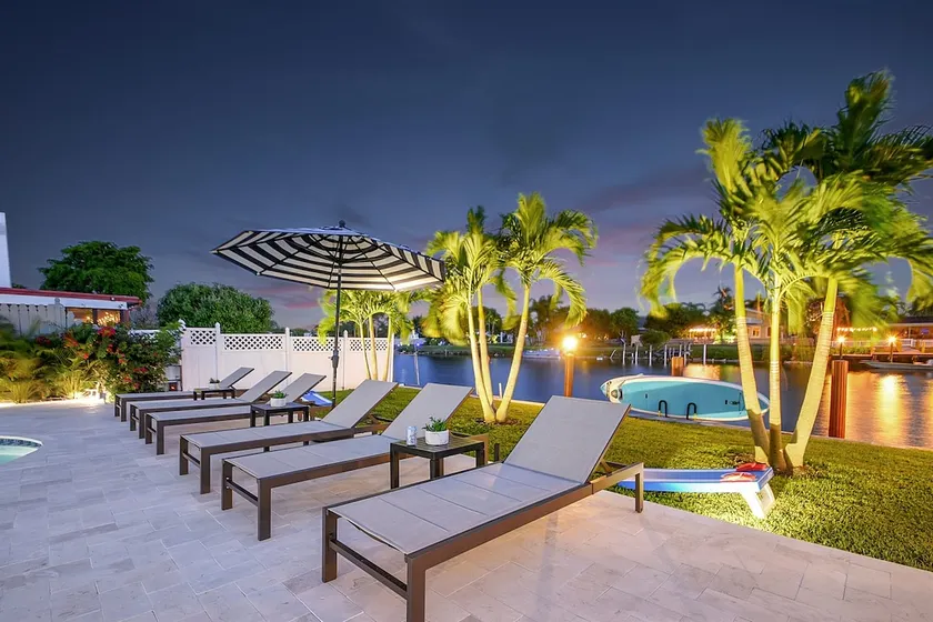 796 | Waterfront | Sleeps 10 | Heated Pool |Tiki Hut |Fire Pit |by DelrayNightly - Image 1