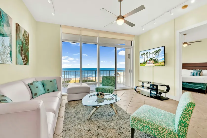 Waterfront dream condo with breathtaking views, pool, hot tub, & game room - Image 1