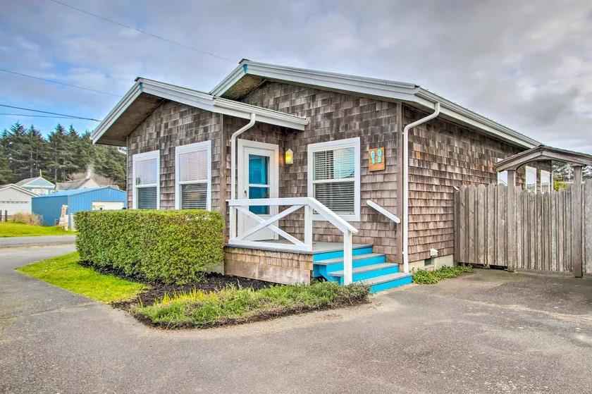 Steps to Beach! Airy Coastal Escape w/ Deck - Image 1