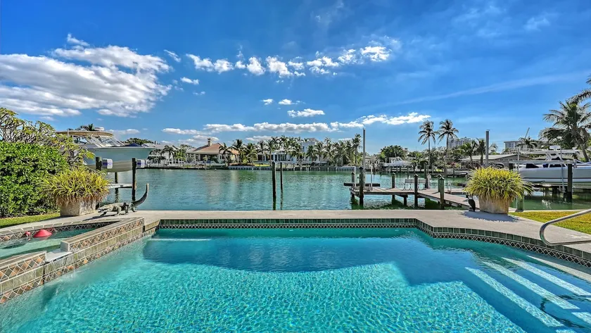 Gorgeous Canalfront Home w/ Heated Pool • 5-Min Walk to Lido Beach • Boat Dock - Image 1