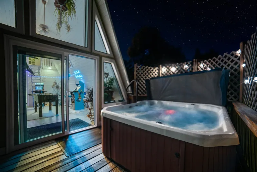 The Yay Frame Hot Tub and Sauna Arcade Staycation - Image 1