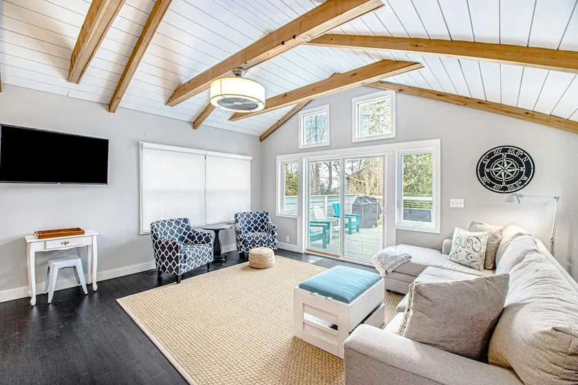 Modern Lakefront Gem with Beach Cabana & Firepit - Image 1