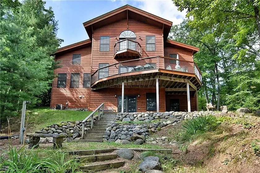 Custom Built Luxury Home On Big Round Lake With Game Room and Open Floor Plan - Image 1