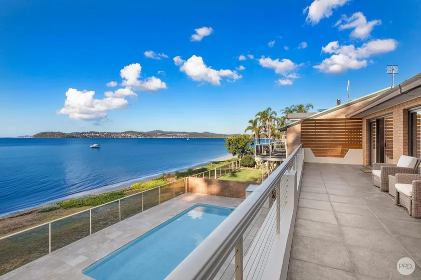 Seaside Sanctuary - Waterfront Luxury Home with Heated Pool - Image 1