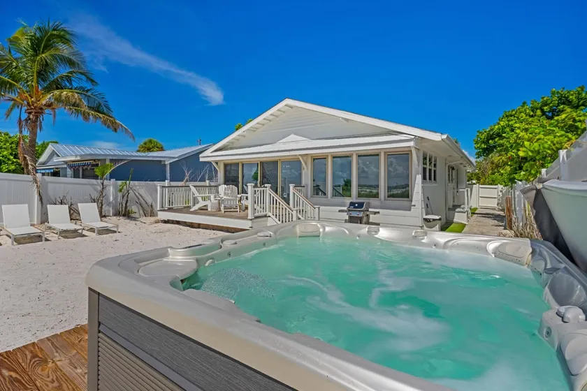 Serendipity Gulfront - Hot Tub - Heated Pool -Golf Cart - Image 1