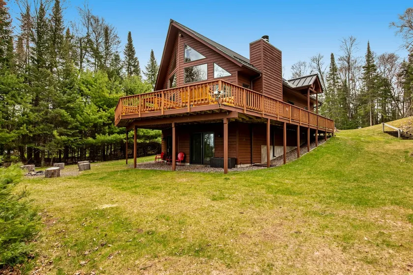 Stunning Lakefront Escape with Firepit & Deck - Image 1