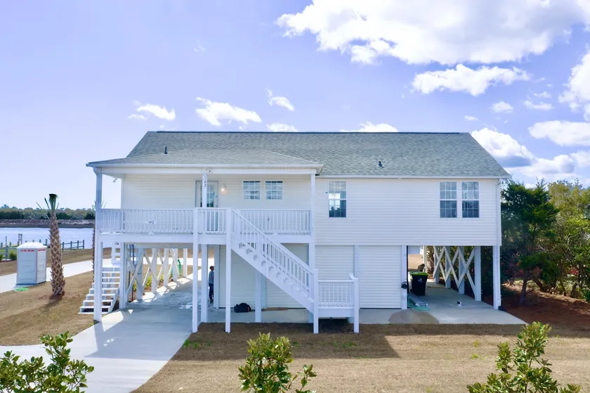 Waterfront home with Private Dock Hot tub and swimming as well as a large fenced backyard - Image 1