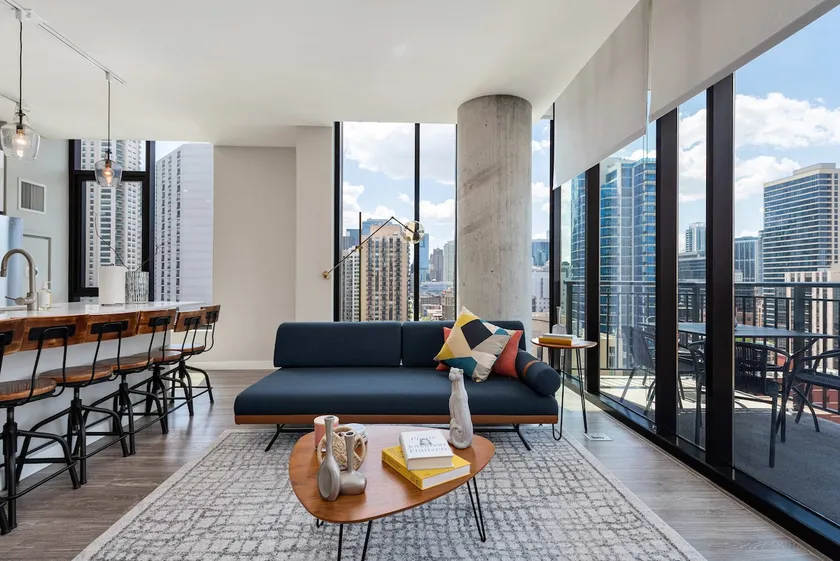 Downtown 2BR Oasis: Skyline Views + Prime Location - Image 1