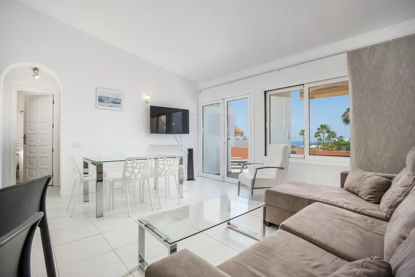 Sunny Haciendas IV · 2BR Apt with Sea View Balcony - Image 1