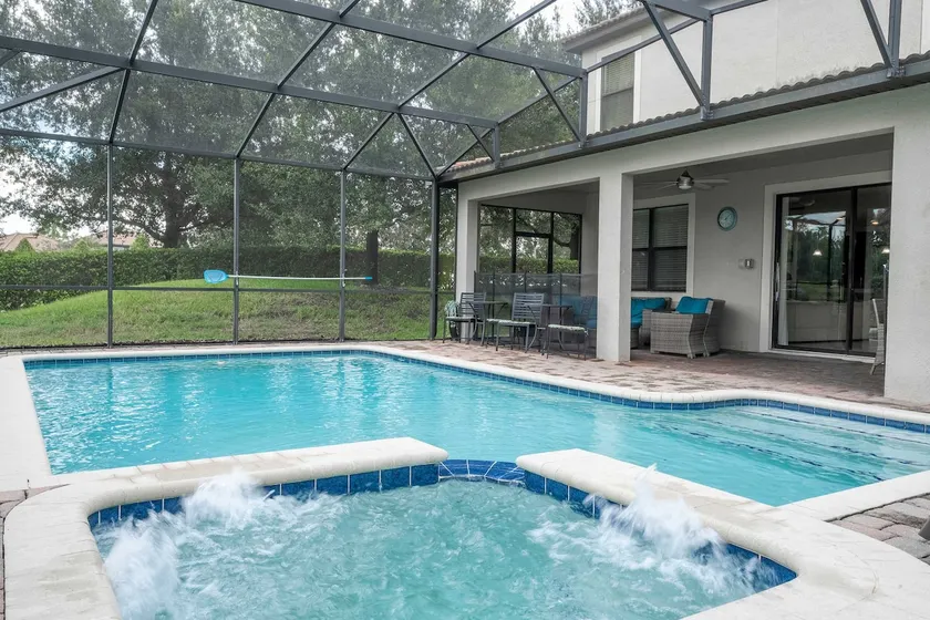 1400 ChampionsGate 8BR Home with Pool, Cinema & Game Room - Image 1