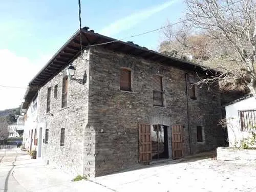 Old stone manor house restored in a mountain area. - Image 1