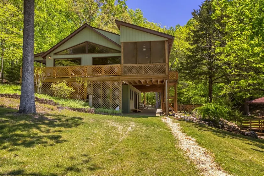 Stylish 4BR Lakefront Cabin w/ Hot Tub - Image 1